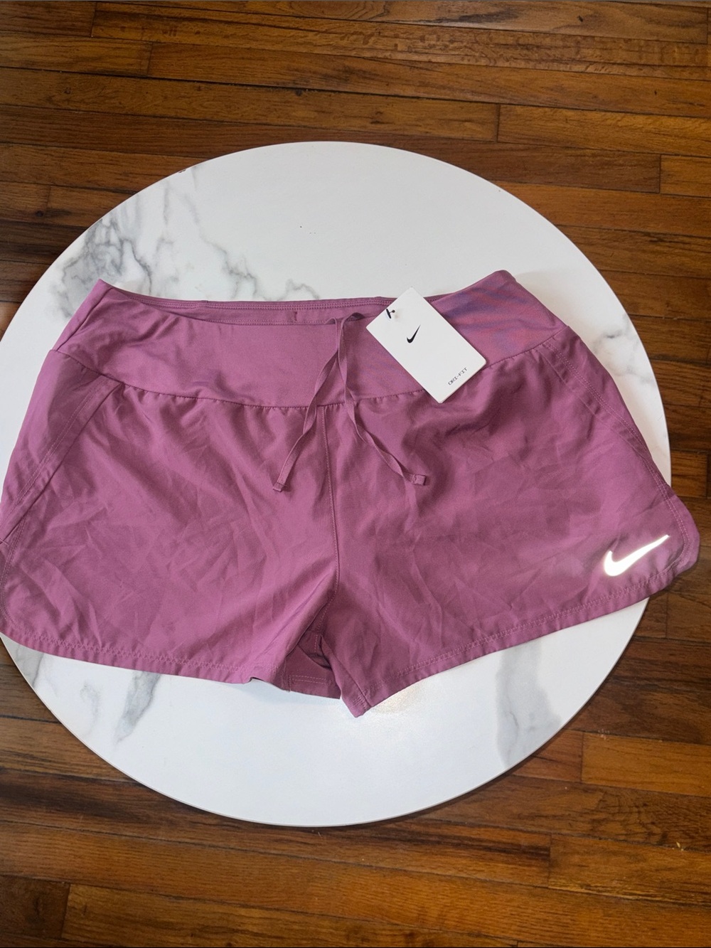 Nike Women's Mauve Athletic Shorts with Reflective Swoosh
